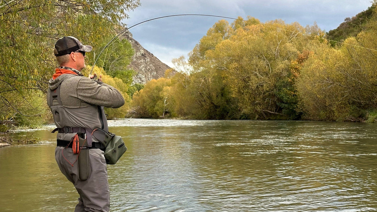 Fly fishing on the Mataura River in autumn, Southland New Zealand